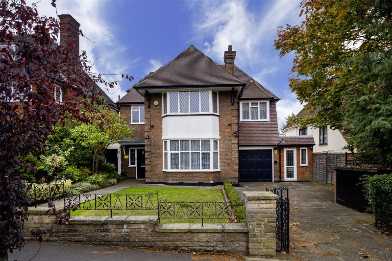 View of the garden and terrace area of a luxurious apartment at West Heath Place, NW11